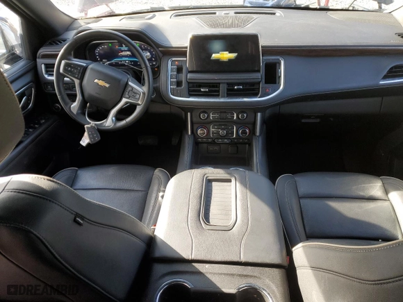 2023 Chevrolet Suburban Premier with VIN 1GNSCFKD5PR394675, listed as a Copart auction lot 49641395 with 56,946 mi miles and Salvage Title. Bid and sale history available at carsss.com. Image 8.
