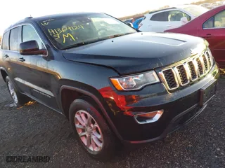 2021 Jeep Grand Cherokee Laredo X with VIN 1C4RJFAG4MC666723, listed as a IAAI auction lot 41364124 with 67,239 mi miles. Bid and sale history available at carsss.com. Image 1.