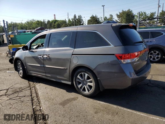 2016 Honda Odyssey Touring Elite with VIN 5FNRL5H91GB092214, listed as a Copart auction lot 61158745 with 121,477 mi miles and Salvage title. Bid and sale history available at DreamBid. Image 2.
