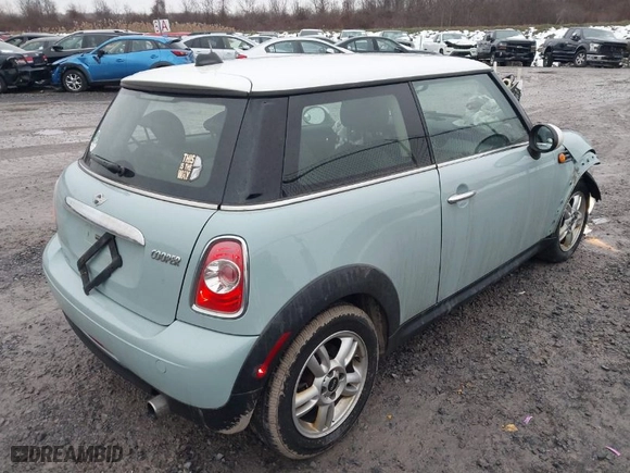 2013 MINI Cooper Hardtop with VIN WMWSU3C51DT686959, listed as a IAAI auction lot 41020389 with 86,770 mi miles. Bid and sale history available at carsss.com. Image 4.