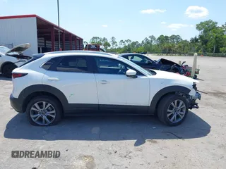 2024 Mazda CX-30 S Carbon Edition with VIN 3MVDMBCM2RM719131, listed as a IAAI auction lot 42265739 with 8,470 mi miles and . Bid and sale history available at DreamBid. Image 14.