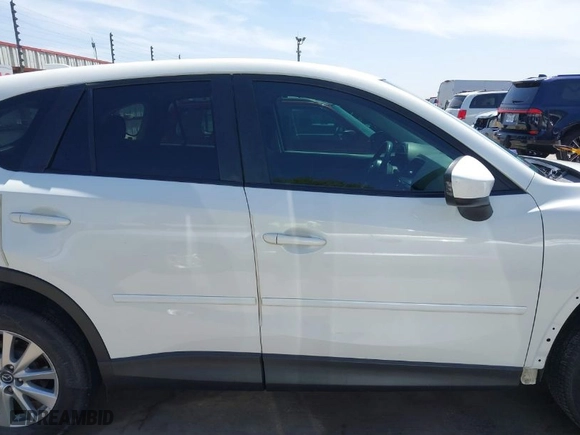 2014 Mazda CX-5 Touring with VIN JM3KE2CY2E0426164, listed as a IAAI auction lot 41812932 with 186,015 mi miles. Bid and sale history available at carsss.com. Image 14.
