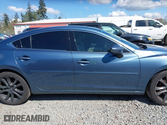 2016 Mazda Mazda6 i Grand Touring with VIN JM1GJ1W51G1436977, listed as a IAAI auction lot 42097363 with 128,941 mi miles. Bid and sale history available at carsss.com. Image 13.