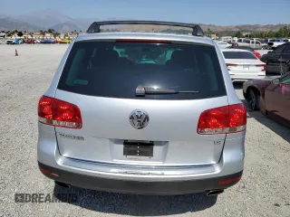 2005 Volkswagen Touareg z VIN WVGCM77L95D014940, wystawiony jako Copart lot #60156795 z przebiegiem 114 551 mil mil oraz Czysty tytuł • Clean title. Historia ofert i sprzedaży dostępna na DreamBid. Obrazek 6.