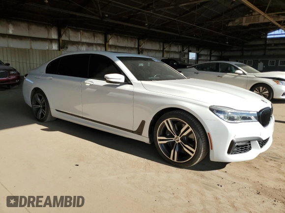 2016 BMW 7 Series 750i с VIN WBA7F0C56GGM20803, выставлен на аукционе Copart как лот 51183415 с пробегом 70 728 миль миль и Чистый • Clean title. История ставок и продаж доступна на DreamBid. Изображение 4.
