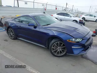 2019 Ford Mustang EcoBoost z VIN 1FA6P8TH6K5169215, wystawiony jako IAAI lot #42111840 z przebiegiem 68 595 mil mil oraz . Historia ofert i sprzedaży dostępna na DreamBid. Obrazek 1.