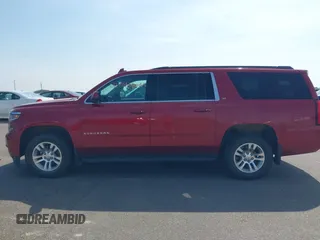 2015 Chevrolet Suburban LT with VIN 1GNSKJKC5FR726299, listed as a IAAI auction lot 42740904 with 96,700 mi miles and . Bid and sale history available at DreamBid. Image 14.