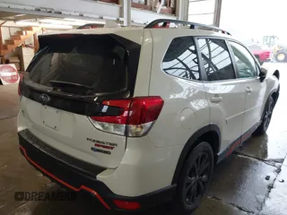 2022 Subaru Forester Sport with VIN JF2SKAJC6NH440364, listed as a IAAI auction lot 41034901 with 30,236 mi miles. Bid and sale history available at carsss.com. Image 4.