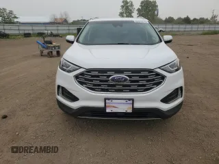2020 Ford Edge SEL z VIN 2FMPK4J95LBB21392, wystawiony jako Copart lot #60912275 z przebiegiem 82 527 mil mil oraz Szkoda całkowita • Salvage title. Historia ofert i sprzedaży dostępna na DreamBid. Obrazek 5.