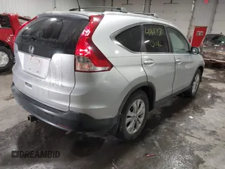 2013 Honda CR-V EX-L with VIN 2HKRM3H72DH504122, listed as a IAAI auction lot 41647580 with 217,451 mi miles and . Bid and sale history available at DreamBid. Image 4.