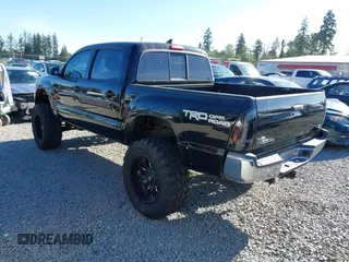 2015 Toyota Tacoma with VIN 3TMLU4EN1FM167938, listed as a IAAI auction lot 42349196 with 150,865 mi miles and . Bid and sale history available at DreamBid. Image 3.