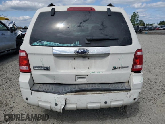 2010 Ford Escape Hybrid z VIN 1FMCU5K30AKC45288, wystawiony jako Copart lot #53479505 z przebiegiem 111 458 mil mil oraz Szkoda całkowita • Salvage title. Historia ofert i sprzedaży dostępna na DreamBid. Obrazek 6.