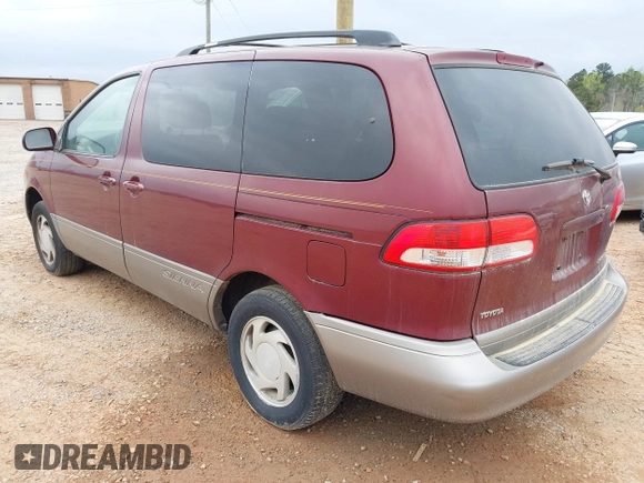 2002 Toyota Sienna LE with VIN 4T3ZF13C12U437425, listed as a IAAI auction lot 41157987 with 200,309 mi miles. Bid and sale history available at carsss.com. Image 3.