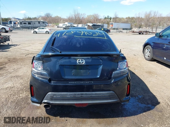 2016 Scion tC with VIN JTKJF5C71GJ020893, listed as a IAAI auction lot 41891029 with 76,341 mi miles. Bid and sale history available at carsss.com. Image 17.