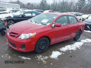 2012 Toyota Corolla L with VIN 2T1BU4EE4CC885807, listed as a IAAI auction lot 41988950 with 209,820 mi miles. Bid and sale history available at carsss.com. Image 2.