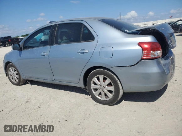 2009 Toyota Yaris with VIN JTDBT903591302633, listed as a Copart auction lot 53512185 with 351,622 mi miles and Salvage Title. Bid and sale history available at carsss.com. Image 2.