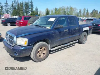 2006 Dodge Dakota SLT with VIN 1D7HW48NX6S708140, listed as a IAAI auction lot 42054527 with 226,944 mi miles and . Bid and sale history available at carsss.com. Image 2.