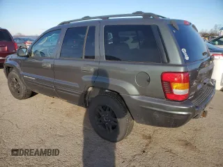 2004 Jeep Grand Cherokee with VIN 1J8GW48N24C304268, listed as a Copart auction lot 45559065 with 252,903 mi miles and Salvage title. Bid and sale history available at DreamBid. Image 2.
