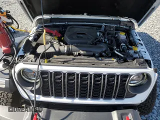 2025 Jeep Wrangler Rubicon with VIN 1C4PJXFN2SW525858, listed as a Copart auction lot 57415905 with 7,802 mi miles and Salvage title. Bid and sale history available at DreamBid. Image 12.