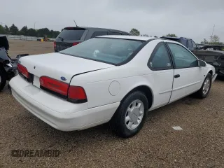 1994 Ford Thunderbird LX with VIN 1FALP62W5RH211700, listed as a Copart auction lot 72046634 with 61,570 mi miles and Salvage Title. Bid and sale history available at DreamBid. Image 3.