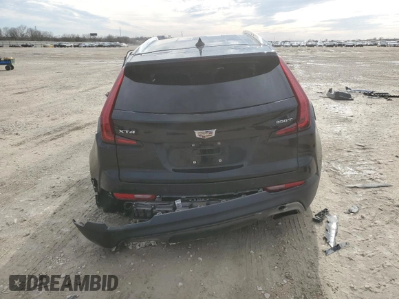 2022 Cadillac XT4 FWD Premium Luxury z VIN 1GYFZCR42NF135325, wystawiony jako Copart lot #43133215 z przebiegiem 48 998 mil mil oraz Szkoda całkowita • Salvage title. Historia ofert i sprzedaży dostępna na DreamBid. Obrazek 6.
