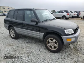 1998 Toyota RAV4 with VIN JT3GP10V7W0028970, listed as a Copart auction lot 51585215 with Not provided miles and Clean title. Bid and sale history available at DreamBid. Image 4.
