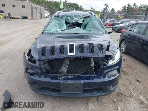 2014 Jeep Cherokee Latitude with VIN 1C4PJMCS0EW290714, listed as a IAAI auction lot 42013774 with 184,729 mi miles and . Bid and sale history available at carsss.com. Image 13.