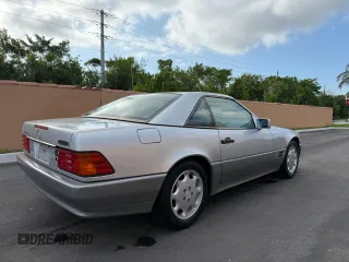 1994 Mercedes-Benz SL z VIN WDBFA63E0RF094472, wystawiony jako Copart lot #58923925 z przebiegiem 55 706 mil mil oraz Tytuł czysty. Historia ofert i sprzedaży dostępna na DreamBid. Obrazek 4.