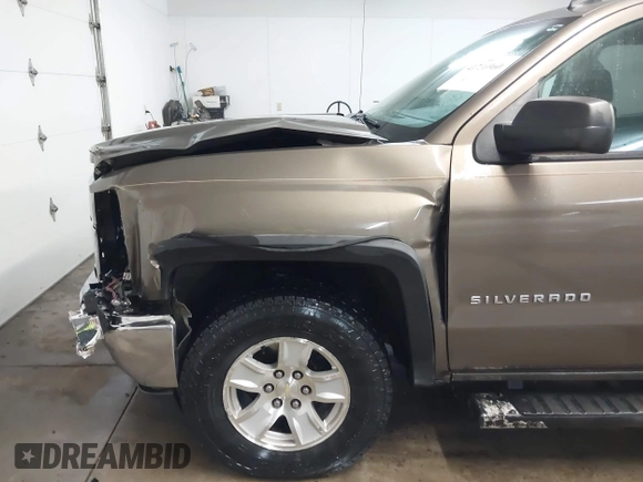 2014 Chevrolet Silverado 1500 LT with VIN 1GCVKREC5EZ147506, listed as a IAAI auction lot 41736960 with 112,399 mi miles and . Bid and sale history available at DreamBid. Image 18.