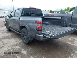2023 Nissan Frontier SV with VIN 1N6ED1EK3PN603948, listed as a IAAI auction lot 42333677 with 38,779 mi miles and . Bid and sale history available at DreamBid. Image 3.