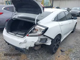 2019 Honda Civic Sport with VIN 2HGFC2F85KH512587, listed as a IAAI auction lot 41708347 with 63,895 mi miles and . Bid and sale history available at DreamBid. Image 4.