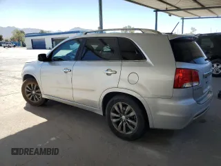 2013 Kia Sorento SX with VIN 5XYKW4A25DG312538, listed as a Copart auction lot 53753565 with 132,883 mi miles and Salvage title. Bid and sale history available at DreamBid. Image 2.