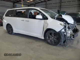 2015 Toyota Sienna SE with VIN 5TDXK3DC8FS662302, listed as a Copart auction lot 57995425 with 181,379 mi miles and Salvage title. Bid and sale history available at DreamBid. Image 4.