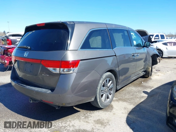 2016 Honda Odyssey Touring Elite with VIN 5FNRL5H97GB010275, listed as a IAAI auction lot 41655328 with Not Provided miles. Bid and sale history available at carsss.com. Image 4.