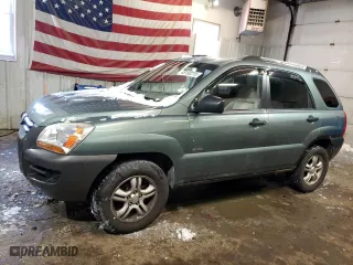2007 Kia Sportage LX with VIN KNDJE723X77419044, listed as a Copart auction lot 45192215 with 128,247 mi miles and Salvage Title. Bid and sale history available at carsss.com. Image 1.