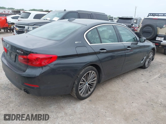 2018 BMW 5 Series 530e with VIN WBAJA9C55JB033575, listed as a IAAI auction lot 42067380 with 111,902 mi miles and . Bid and sale history available at DreamBid. Image 4.