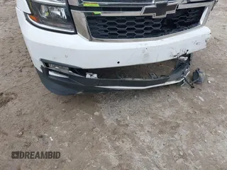 2020 Chevrolet Tahoe LT with VIN 1GNSKBKC2LR253012, listed as a IAAI auction lot 41870002 with 127,789 mi miles and . Bid and sale history available at DreamBid. Image 6.