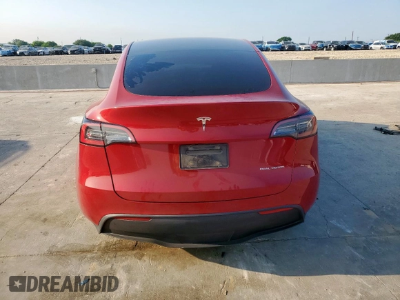 2023 Tesla Model Y Long Range z VIN 7SAYGDEE8PA138780, wystawiony jako Copart lot #53294385 z przebiegiem 137 496 mil mil oraz Szkoda całkowita • Salvage title. Historia ofert i sprzedaży dostępna na DreamBid. Obrazek 6.