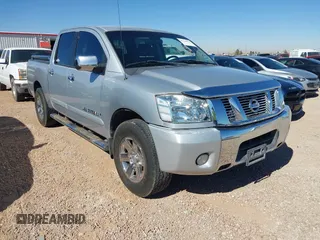 2011 Nissan Titan SV with VIN 1N6BA0ED7BN318878, listed as a IAAI auction lot 41518618 with 169,890 mi miles and . Bid and sale history available at DreamBid. Image 1.