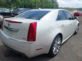 2011 Cadillac CTS Premium with VIN 1G6DP5ED2B0113072, listed as a IAAI auction lot 42797153 with 171,779 mi miles and . Bid and sale history available at DreamBid. Image 4.