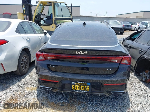 2022 Kia K5 GT-Line z VIN 5XXG64J2XNG095158, wystawiony jako IAAI lot #42163963 z przebiegiem 59 756 mil mil oraz . Historia ofert i sprzedaży dostępna na DreamBid. Obrazek 17.
