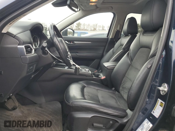 2018 Mazda CX-5 Touring with VIN JM3KFBCM9J0433729, listed as a Copart auction lot 49945515 with 143,064 mi miles and Salvage Title. Bid and sale history available at carsss.com. Image 7.