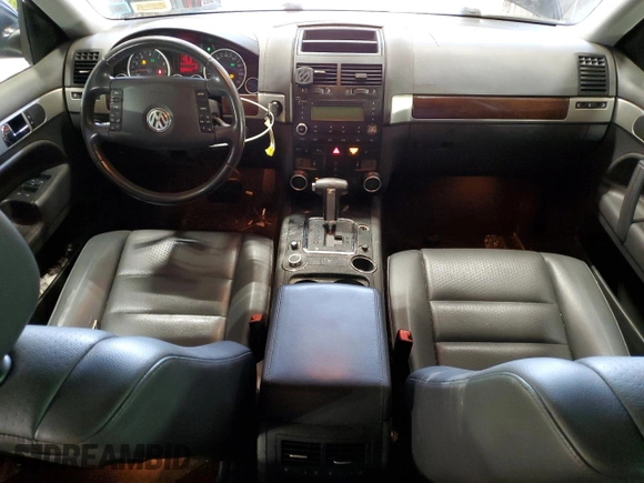 2010 Volkswagen Touareg VR6 with VIN WVGBF7A99AD002591, listed as a Copart auction lot 70624234 with 154,330 mi miles and Salvage Title. Bid and sale history available at DreamBid. Image 8.