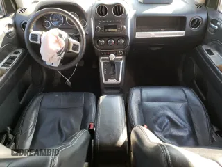 2016 Jeep Compass Latitude with VIN 1C4NJDEB2GD697923, listed as a Copart auction lot 84081394 with 167,240 mi miles and Salvage Title. Bid and sale history available at carsss.com. Image 8.