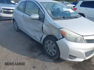 2014 Toyota Yaris L with VIN JTDJTUD33ED592307, listed as a IAAI auction lot 41418409 with 91,209 mi miles and . Bid and sale history available at DreamBid. Image 12.