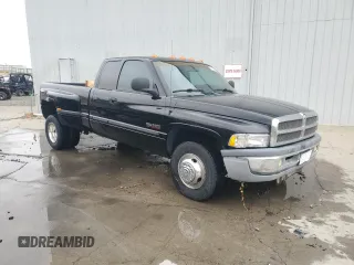 1999 Dodge Ram 3500 with VIN 1B7MC3361XJ624548, listed as a Copart auction lot 77225594 with 193,623 mi miles and Salvage Title. Bid and sale history available at carsss.com. Image 4.