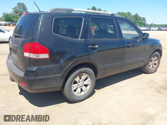 2009 Kia Borrego LX with VIN KNDJJ741395033538, listed as a IAAI auction lot 42088382 with 119,225 mi miles. Bid and sale history available at carsss.com. Image 4.