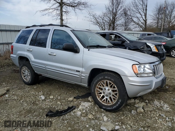 2004 Jeep Grand Cherokee Limited with VIN 1J4GW58N64C174387, listed as a Copart auction lot 43539585 with 138,433 mi miles and Salvage title. Bid and sale history available at DreamBid. Image 4.