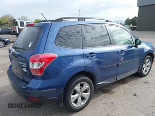 2014 Subaru Forester Premium z VIN JF2SJADC0EH551474, wystawiony jako IAAI lot #41977613 z przebiegiem 62 979 mil mil oraz . Historia ofert i sprzedaży dostępna na DreamBid. Obrazek 4.