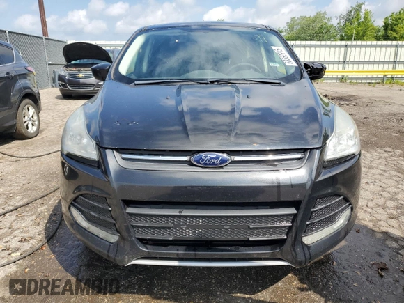 2014 Ford Escape SE z VIN 1FMCU0GX7EUC07212, wystawiony jako Copart lot #58562915 z przebiegiem 129 150 mil mil oraz Czysty tytuł • Clean title. Historia ofert i sprzedaży dostępna na DreamBid. Obrazek 5.